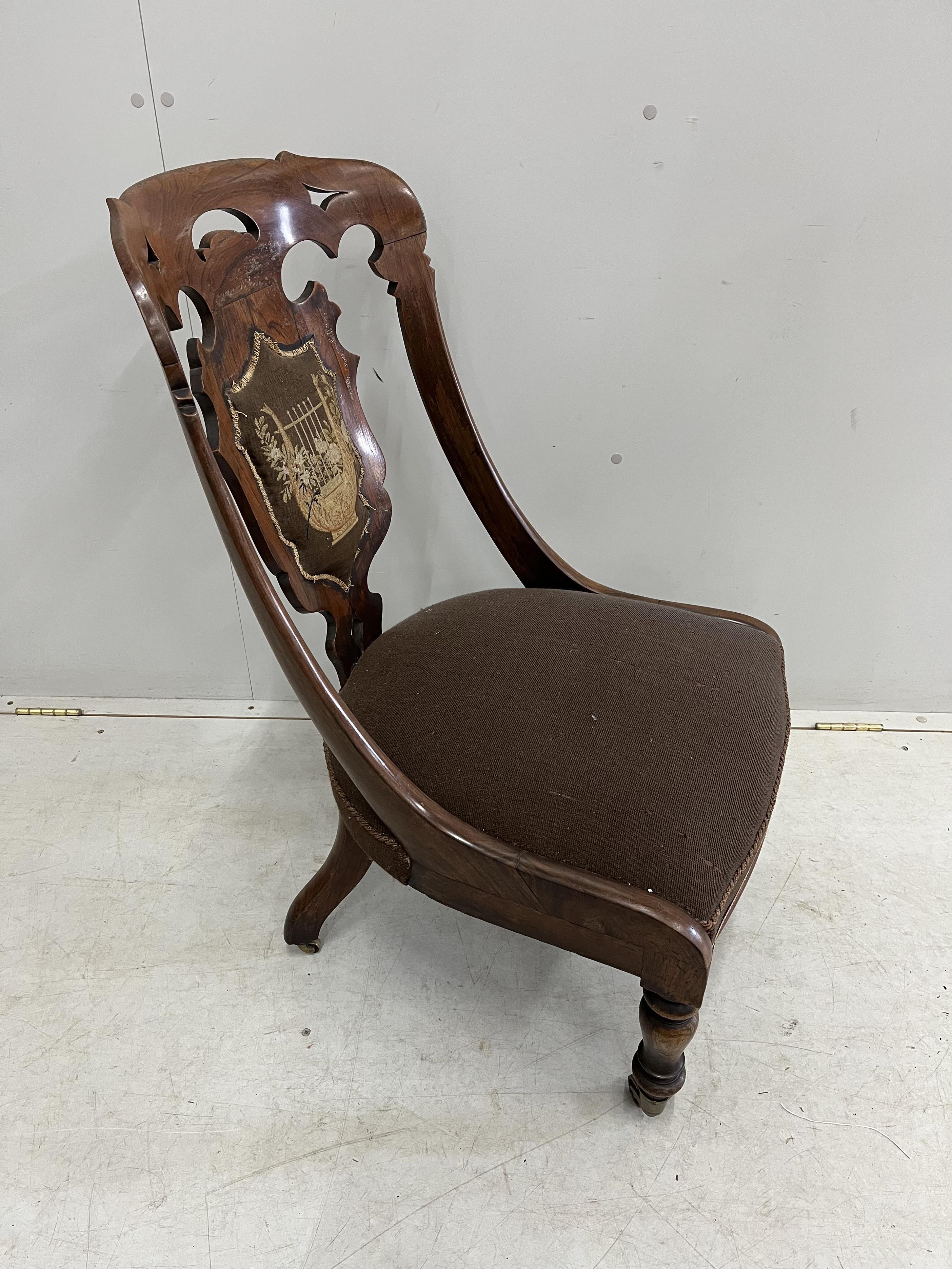 A Victorian rosewood side chair, width 52cm, height 87cm. Condition - fair
